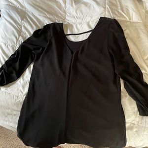 Black knee length dress, open back-worn once.